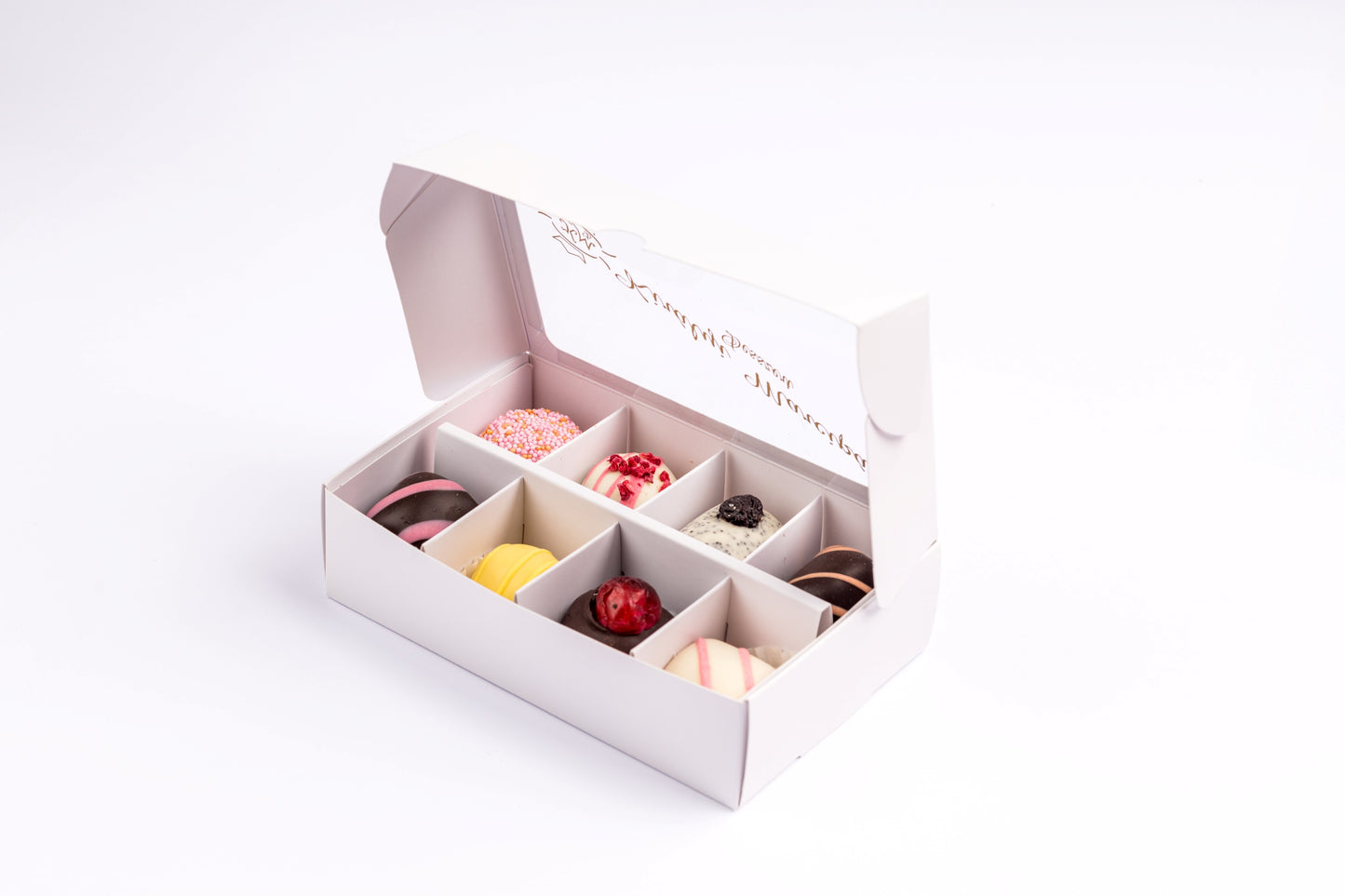 Díszdoboz 8 darab válogatott marcipánnal. Gift box with 8 pieces of assorted marzipan. Geschenkbox mit 8 Stück ausgewähltem Marzipan.